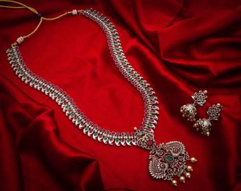 Give An Enhanced Look To Your Personality By Pairing Up This Beautiful Necklace Set With Your Ethnic Attire. This Pretty Set Is In Silver Color Which Can Be Paired With Any Colored Attire. Buy Now.