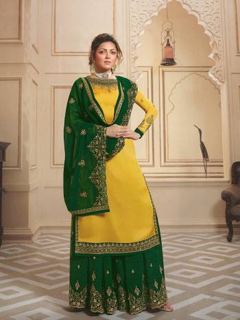 Here Is A Designer Suit In Green And Yellow Color Which Comes With Two Bottom. Its Pretty Embroidered Top Is Fabricated On Satin Georgette Paired With Santoon Bottom And Embroidered Georgette Fabricated Sharara And Dupatta. Pair This Up With Any Of The Bottoms As Per Occasion. 