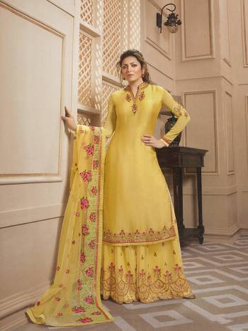 Celebrate This Festive Season In Very Pretty All Over Yellow Colored Designer Suit. This Suit Comes With Two Bottoms You can Pair It Up As Per The Occsion. Its Top Is Fabricated On Satin Georgette Paired With Santoon Bottom And Georgette Fabricated Sharara And Dupatta. 