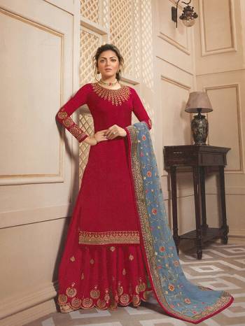 This Festive Season Look The Most Elegant Of All Wearing This Designer Suit In Red Colored Top, Bottom And Sharara Paired With A Very Pretty Grey Colored Dupatta. Its Top Is Satin Georgette Based Paired With Santoon Bottom And Georgette Fabricated Sharara And Dupatta. 