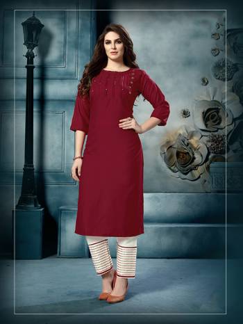 Celebrate This Festive Season With Beauty And Comfort Wearing This Readymade Paiur Of Kurti With Pants. This Cotton Kurti Is In Maroon Color Paired With Cotton Fabricated White Colored Embroidered Pants. Buy Now.