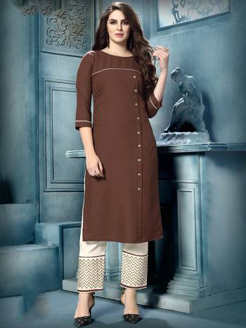 Flaunt Your Rich And Elegant Taste In This  Designer Readymade Kurti In Brown Color Paired With White Colored Readymade Pant. This Kurti And Pants Are Fabricated On Cotton, Its Fabric Is Soft Towards skin And Ensures Superb Comfort All Day Long. 