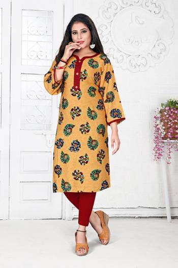 Here Is A Simple Readymade Kurti For Your Casual Wear In Occur Yellow And Multi Color Fabricated On Rayon Beautified With Prints. It Is Light In Weight And Easy To Carry All Day Long.