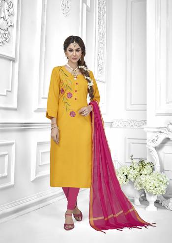 If Those Readymade Suit Does Not Lend You The Desired Comfort Than Grab This Designer Dress Material And Get This Stitched As Per Your Desired Fit And Comfort, Its Top Is In Musturd Yellow Color Paired With Contrasting Dark Pink Colored Bottom And Dupatta. 