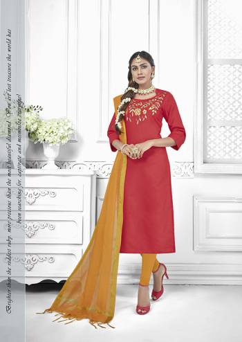 If Those Readymade Suit Does Not Lend You The Desired Comfort Than Grab This Designer Dress Material And Get This Stitched As Per Your Desired Fit And Comfort, Its Top Is In Red Color Paired With Contrasting Musturd Yellow Colored Bottom And Dupatta. 