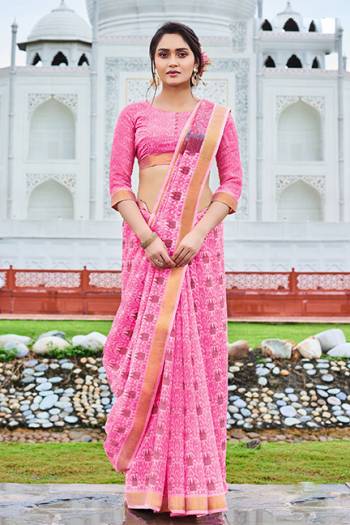 Add This Pretty Saree To Your Wardrobe For Your Semi-Casual Wear, This Lovely Pink Colored Saree And Blouse Are Fabricated Cotton Chiffon. Its Fabric Is Soft Towards Skin And Easy To Carry All Day Long. 