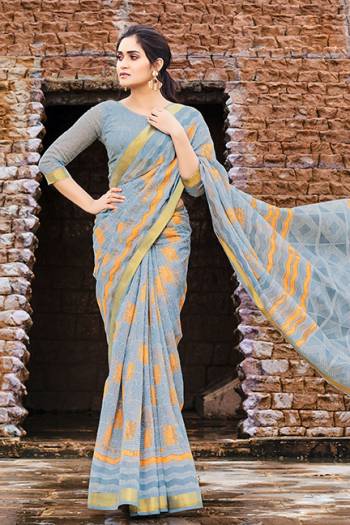 Add This Pretty Saree To Your Wardrobe For Your Semi-Casual Wear, This Lovely Grey Colored Saree And Blouse Are Fabricated Cotton Chiffon. Its Fabric Is Soft Towards Skin And Easy To Carry All Day Long. 