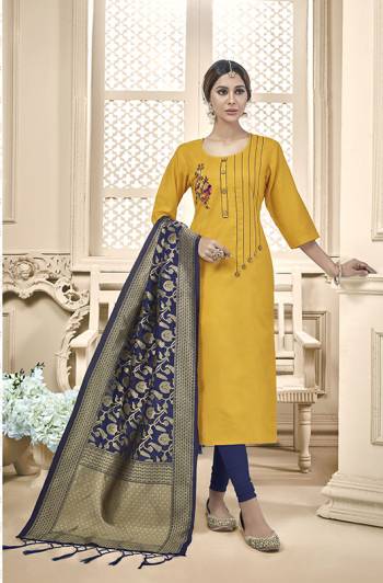 Celebrate This Festive Season With Beauty And Comfort Wearing This Designer Straight Suit In Yellow Color Paired With Contrasting Navy Blue Colored Bottom And Dupatta. This Dress Material Is Cotton based Paired With Banarasi Silk Fabricated Dupatta. Buy Now.