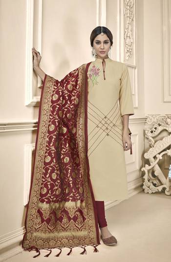 Flaunt Your Rich And Elegant Taste In This Lovely Color Pallete Designer Suit In Cream Colored Top Paired With Maroon Colored Bottom And Dupatta. This Dress Material Is Cotton Based Paired With Banarasi Silk Fabricated Dupatta.