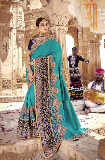 Celebrate This Festive And Wedding Season Wearing This Heavy Designer Saree In Attractive Shades of Blue Color. This Saree And Blouse Are Rich Silk based With Heavy Embroidery All Over. 