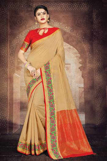 Simple And Elegant Silk Based Saree For Your Casual Or Semi-Casual Wear In Beige Color Paired With Contrasting Red Colored Blouse. This Saree Is Light In Weight And easy To Carry all Day Long.