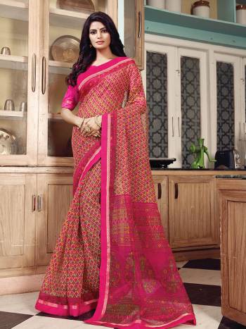 Shine Bright Wearing This Saree In Dark Pink Color Paired With Dark Pink Colored Blouse. This Saree Is Fabricated On Super Net Paired With Art Silk Fabricated Blouse. It Is Beautified With Prints All Over.