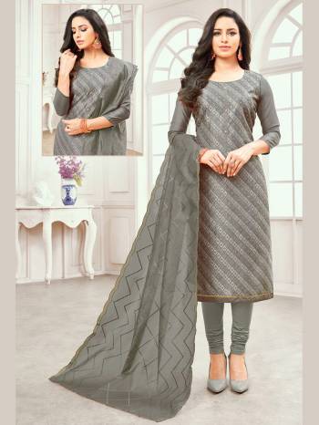 Look Pretty In This Simple And Elegant Looking Embroidered Dress Material In Grey Color. Its Thread Embroidered Top And Dupatta are Fabricated on Cotton Satin Paired With Cotton Fabricated Plain Bottom. Buy Now.