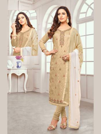 Simple And Elegant Looking Designer Dress Material Is Here In Beige Colored Top Paired With Beige Colored Bottom And Shaded Dupatta In Off-White And Beige. Its Embroidered Top Is Silk Based Paired With Cotton Bottom And Chiffon Fabricated Dupatta. 