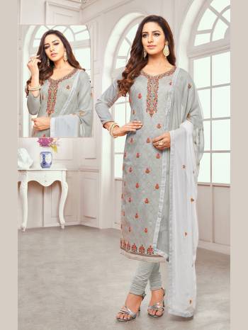 Simple And Elegant Looking Designer Dress Material Is Here In Grey Colored Top Paired With Grey Colored Bottom And Shaded Dupatta In Off-White And Grey. Its Embroidered Top Is Silk Based Paired With Cotton Bottom And Chiffon Fabricated Dupatta. 