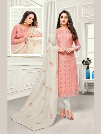 Look Pretty In This Designer Straight Suit In Peach Color Paired With White Colored Bottom And Dupatta. This Dress Material Is Cotton Beautified With Elegant Thread Work. 