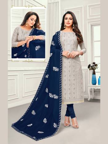 Look Pretty In This Designer Straight Suit In Grey Color Paired With Navy Blue Colored Bottom And Dupatta. This Dress Material Is Cotton Beautified With Elegant Thread Work. 