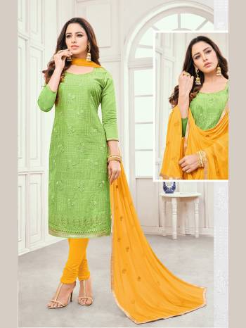 Celebrate This Festive Season With Beauty And Comfort Wearing This Pretty Suit In Green Colored Top Paired With Yellow Colored Bottom And Dupatta. Its Top Is Fabricated On Cotton Satin Paired With Cotton Bottom And Chiffon Fabricated Dupatta. Get This Dress Material Stitched As Per Youe Desired Fit And Comfort. 