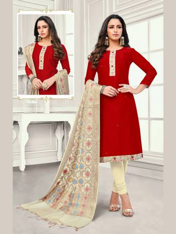 If Those Readymade Suit Does Not Lend You The Desired Comfort Than Grab This Dress Material In Red And Off-White Color and Get This Stitched As Per Your Desired Fit And Comfort. This Dress material Is Cotton based Paired With Jacquard Silk Fabricated Dupatta. 