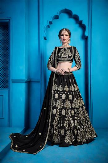 For A Bold And Beautiful Look, Grab This Attractive Looking Heavy Embroidered Designer Lehenga Choli In All Over Black Color. This Lehenga Choli Is Silk Based Paired With Net Fabricated Dupatta. Buy Now.