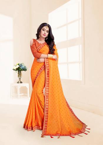 Flaunt Your Rich And Elegant Taste In This Designer Saree In Musturd Yellow Color. This Chiffon Based Saree Is Paired With Jacquard Silk Fabricated Blouse. Its Rich Color Pallete And Fabric Will Earn You Lots Of Compliments From Onlookers.