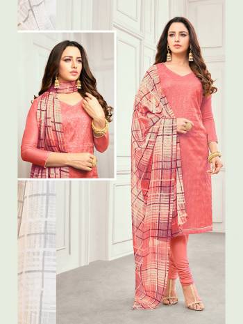 Grab This Pretty Suit In Pink Color For Your Casual Or Semi-Casual Wear. Its Pretty Embroidered Top Is Fabricated On Linen Satin Paired With Cotton Bottom And Brasso Fabricated Dupatta. Buy This Dress Material Now.