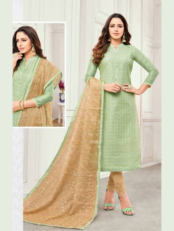 Simple And Elegant Looking Designer Suit Is Here In Light Green Colored Top Paired With Beige Colored Bottom And Dupatta. This Dress Material Is Satin Cotton Based Paired With Cotton Bottom And Net Fabricated Dupatta. It I Beautified With Detailed Embroidery Over The Top And Dupatta. 