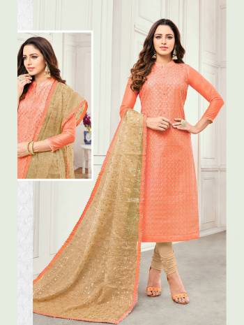 Simple And Elegant Looking Designer Suit Is Here In Dark Peach Colored Top Paired With Beige Colored Bottom And Dupatta. This Dress Material Is Satin Cotton Based Paired With Cotton Bottom And Net Fabricated Dupatta. It I Beautified With Detailed Embroidery Over The Top And Dupatta. 