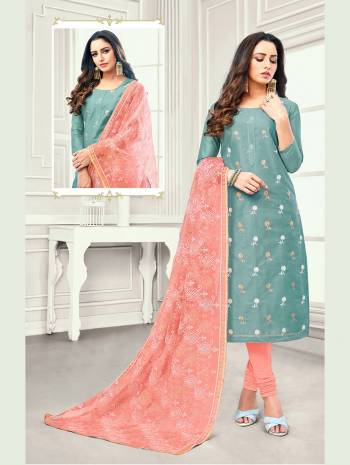 This Festive Season, Grab This Pretty Dress Material In Steel Blue Colored Top Paired With Contrasting Dark Peach Colored Bottom And Dupatta. Its Top IS Satin Cotton Based Paired With Cotton Botttom And Net Fabricated Dupatta. 