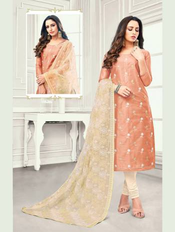 This Festive Season, Grab This Pretty Dress Material In Light Brown Colored Top Paired With Contrasting Cream Colored Bottom And Dupatta. Its Top IS Satin Cotton Based Paired With Cotton Botttom And Net Fabricated Dupatta. 