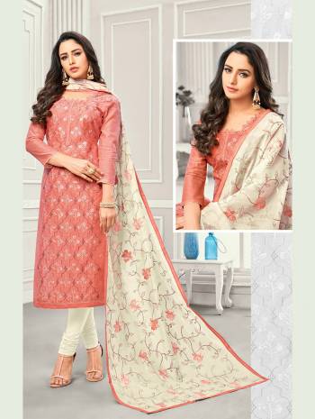 Here Is A Designer Straight Suit In Dark Peach Colored Top Paired With Off-white Colored Bottom And Dupatta. Its Top And Dupatta are Satin Cotton Based Paired With Cotton Fabricated Bottom. Buy This Dress Material Now.