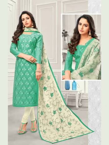 Here Is A Designer Straight Suit In Green Colored Top Paired With Off-white Colored Bottom And Dupatta. Its Top And Dupatta are Satin Cotton Based Paired With Cotton Fabricated Bottom. Buy This Dress Material Now.