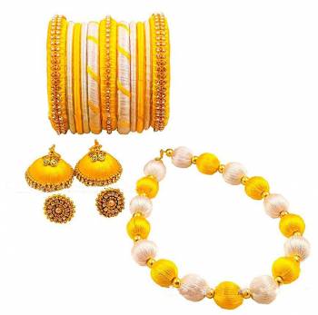 Grab This Beautiful Set Of Necklace Which Comes With A very Pretty?Pair Of Earrings And Bangles Set. This Pretty set Is Made With Resham Thread Beautified With Stone Work. It Can Be Paired With Any Same Or Contrasting Colored Ethnic Attire.