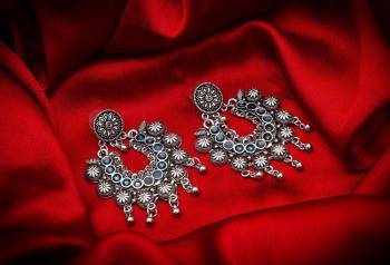 Buy This Pretty Pair Of Earrings In Silver Color Which Can Be Paired With Colored Attire. These Earrings Will Give A Pretty Elegant Look Which Will eanr You Lots Of Compliments From Onlookers