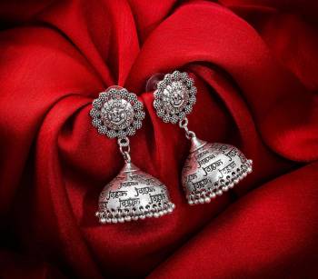 Buy This Pretty Pair Of Earrings In Silver Color Which Can Be Paired With Colored Attire. These Earrings Will Give A Pretty Elegant Look Which Will eanr You Lots Of Compliments From Onlookers