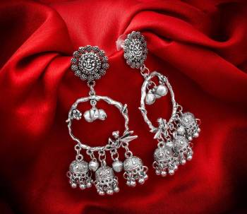 Buy This Pretty Pair Of Earrings In Silver Color Which Can Be Paired With Colored Attire. These Earrings Will Give A Pretty Elegant Look Which Will eanr You Lots Of Compliments From Onlookers