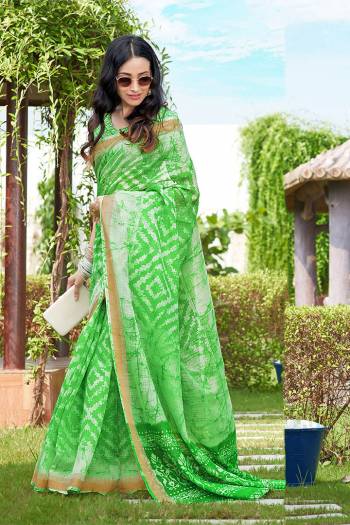 Here Is A Pretty Saree For Your Semi-Casual Wear. This Beautiful?Printed Saree Is Fabricated On Super Net Paired With Cotton Fabricated Blouse. Its Attractive Broad Border Is Beautified With Multi Colored Thread Work.