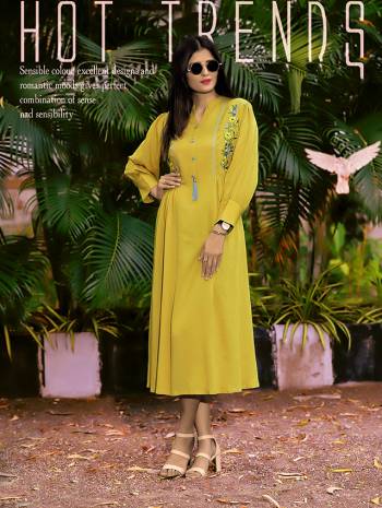 For Your Semi-Casuals, Grab This Designer Readymade Kurti In Pretty Yellow Color, This Pretty Trendy Patterned Kurti IS Fabricated On Rayon Beautified With Thread Embroidery. 