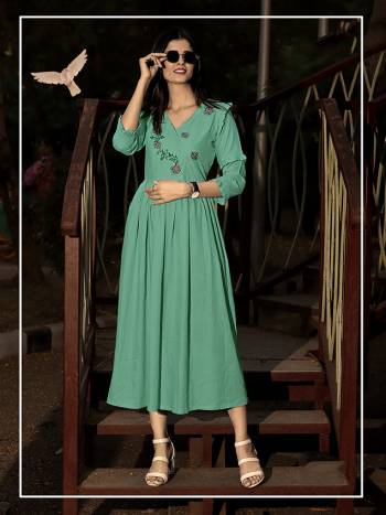 You Will Definitely Earn Lots Of Compliments Wearing This Designer Readymade Kurti In Sea Green Color. This Pretty Kurti Has Smart Trendy Pattern Fabricated On Rayon. It Is Light Weight and Available In All Regular Sizes. 