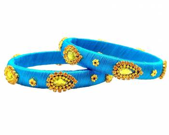 Get This Lovely Pair Of Bangles To Wear It With Your Ethnic Wear. This Pretty Pair Can Be Wore Single Or Can Be Mixed With Other Simple Bangles For Heavy Look.