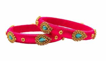 Get This Lovely Pair Of Bangles To Wear It With Your Ethnic Wear. This Pretty Pair Can Be Wore Single Or Can Be Mixed With Other Simple Bangles For Heavy Look.