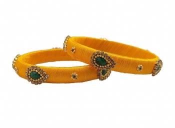 Get This Lovely Pair Of Bangles To Wear It With Your Ethnic Wear. This Pretty Pair Can Be Wore Single Or Can Be Mixed With Other Simple Bangles For Heavy Look.