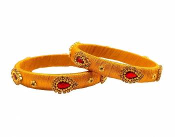 Get This Lovely Pair Of Bangles To Wear It With Your Ethnic Wear. This Pretty Pair Can Be Wore Single Or Can Be Mixed With Other Simple Bangles For Heavy Look.