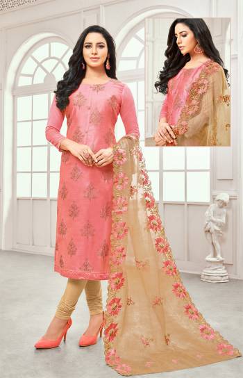 Here Is A Very Pretty Designer Dress Material In Pink Colored Top Paired With Beige Colored Bottom And Dupatta. Its Embroidered Top Is Fabricated On Satin Cotton Paired With Cotton Bottom And Oragenza Fabricated Embroidered Dupatta. 