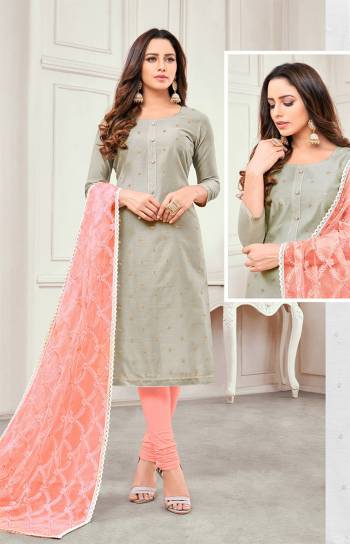 Rich And Elegant Looking Designer Straight Suit Is Here In Grey Colored Top Paired With Peach Colored Bottom And Dupatta. This Dress Material Is Satin Cotton Based Paired With Net Fabricated Dupatta. It Is Beautified With Elegant Embroidery Which Will Earn You Lots Of Compliments From Onlookers. 