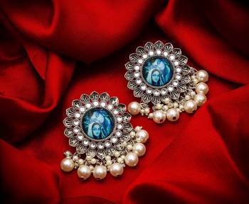 For An Attractive Look, Pair up This Beautiful Pair Of Earrings In Silver Color Which Can Be Paired With Any Colored Ethnic Attire. It Is Light In Weight And Easy To Carry All Day Long.