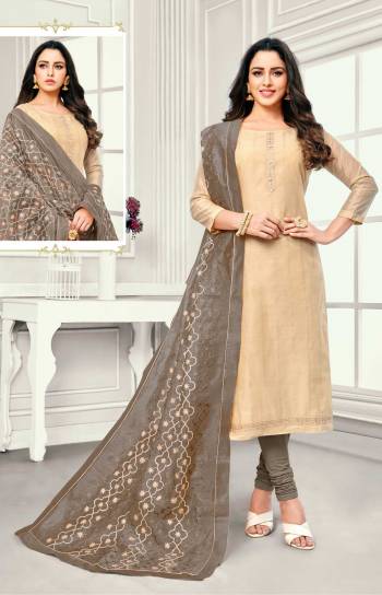 Flaunt Your Rich And Elegant Taste In This Subtle Color Pallete Dress Material In Beige Colored Top Paired With Grey Colored Bottom And Dupatta. Its Top and Dupatta Are Satin Cotton Based Paired With Cotton Fabricated Bottom. Buy This Dress Material Now.