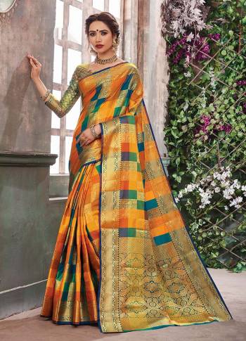 Go Colorful With This Designer Silk Based Saree In Multi Color. This Saree And Blouse Are Fabricated On Banarasi Art Silk Beautified With Multi Colored Checks And Heavy Weave All Over. Buy Now