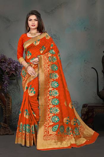 Grab This Pretty Foil Printed Designer Saree In Orange Color Paired With Blue Colored Blouse, This Saree And Blouse Are Fabricated On Nylon Art Silk. Its Rich Fabric And Attractive Weave Will Earn You Lots Of Compliments From Onlookers. 