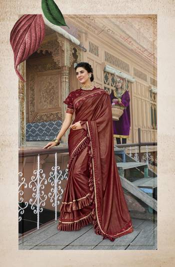 For A Royal Look, Grab This Designer Fancy Saree With Cape In All Over Maroon Color. This Pretty Saree Is Fabricated On Lycra Paired With Art Silk Fabricated Blouse And Embroidered Net Fabricated Cape. Its Trendy Pattern And Design Will Earn You Lots Of Compliments From Onlookers.